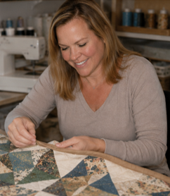 Suzanne working on a quilt